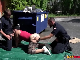 2 cops having hardcore gay interracial sex in the parking lot